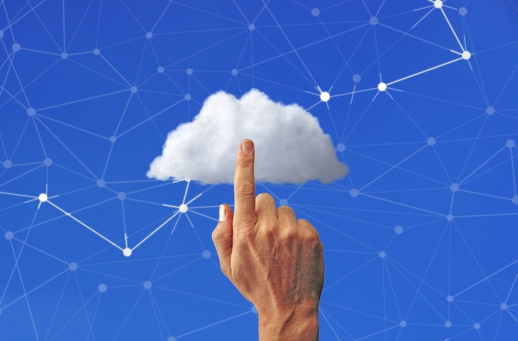 A hand touching cloud network